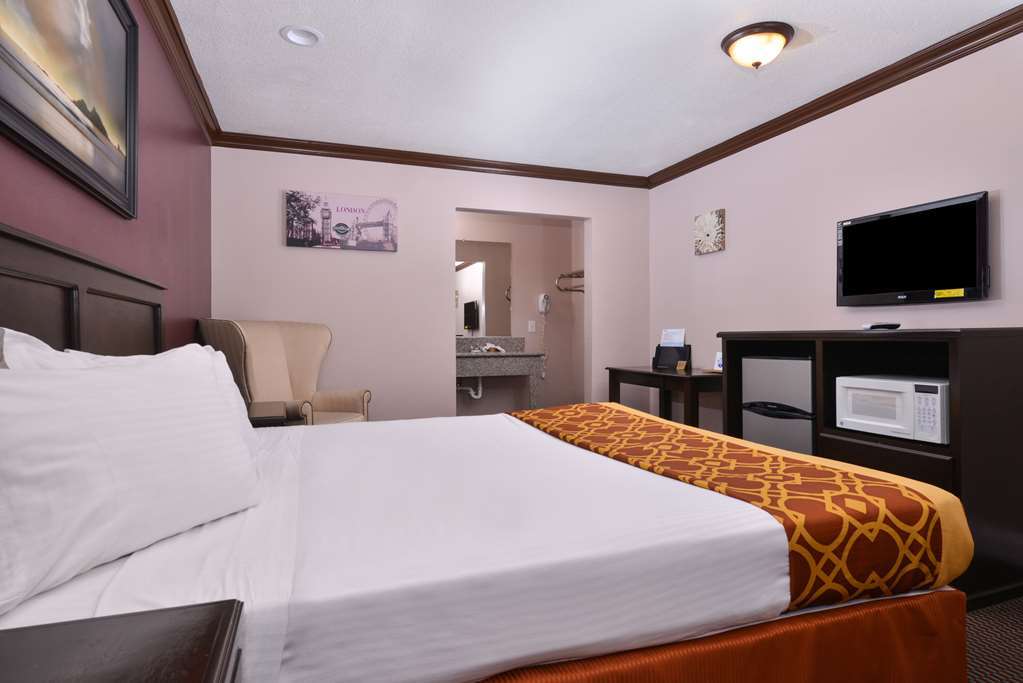 Americas Best Value Inn Корона Стая снимка